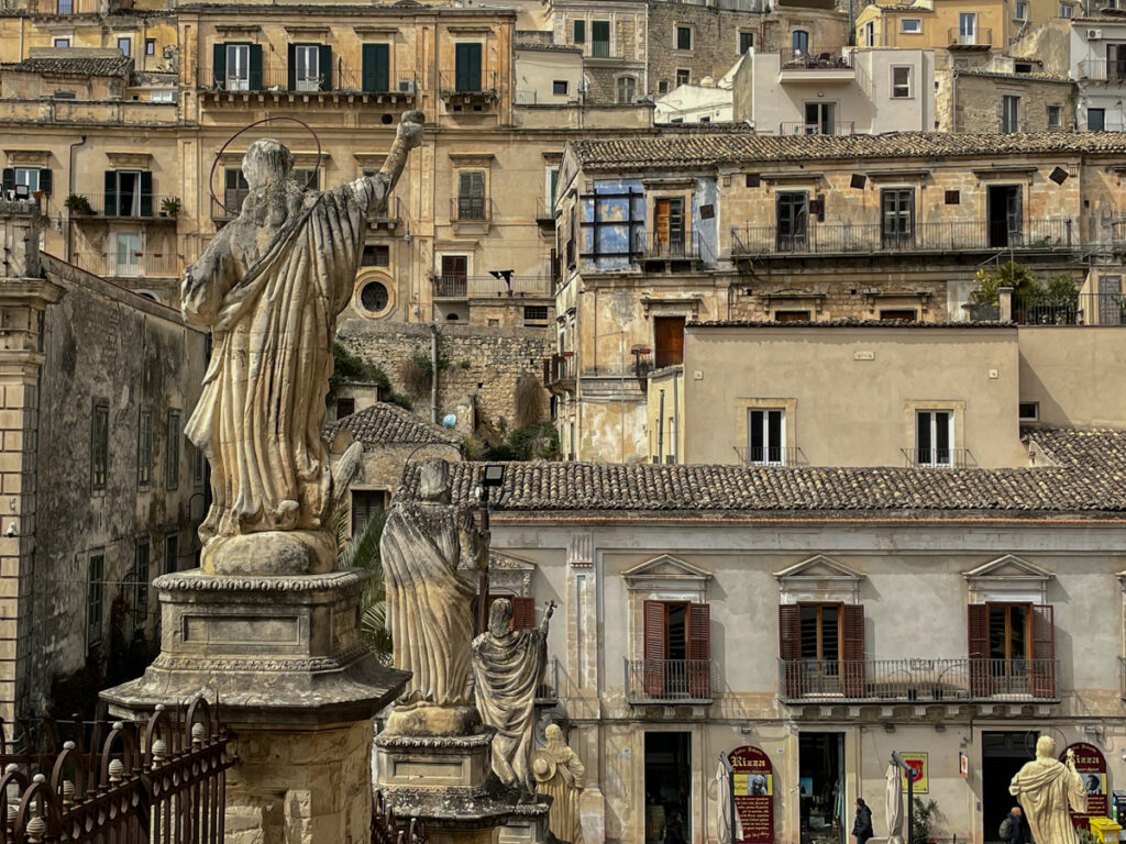 Statues out the front of a church in Modica, Sicily