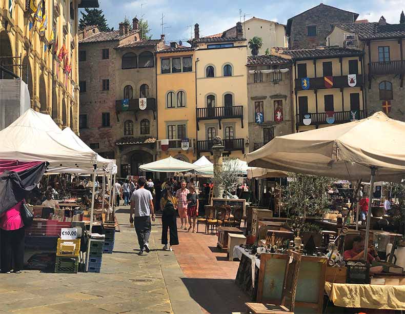 AThe piazza in Arezzo filled with antique stalls