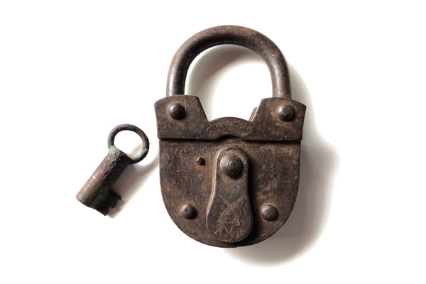 An old steel padlock and key