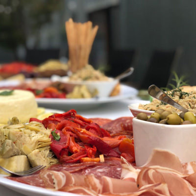 Plates of homemade antipasti