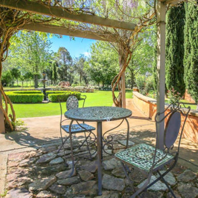 A terrace with wrought iron furniture