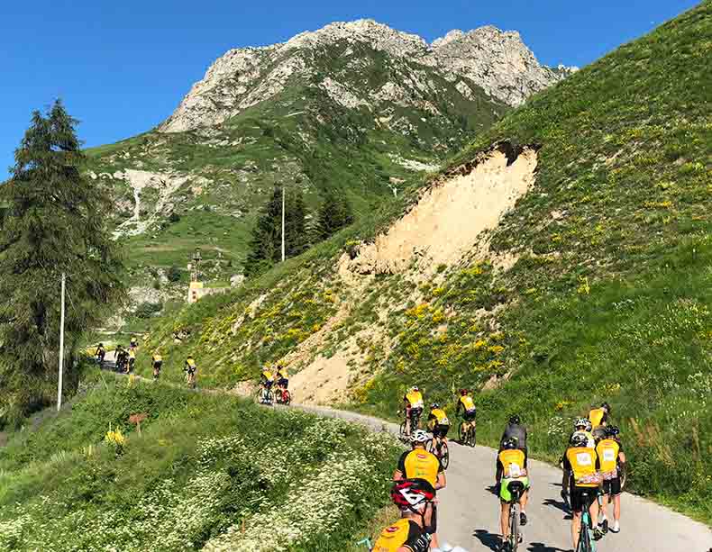 cyclist riding up Colle Fauniera during La Fausto Coppi Gran Fondo