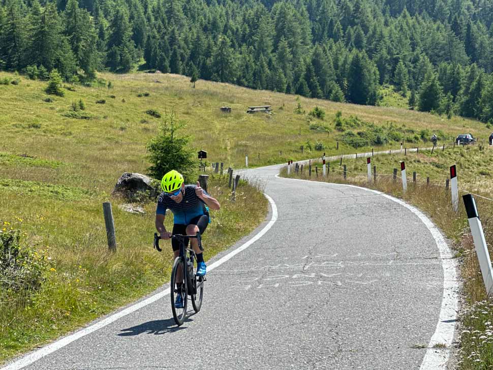A man cycling up to Passo Mortirolo in Italy