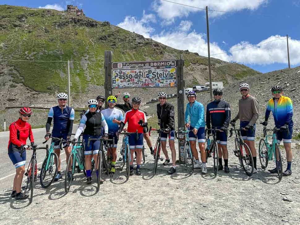 A group of riders at the top of Passo dello Stelvio