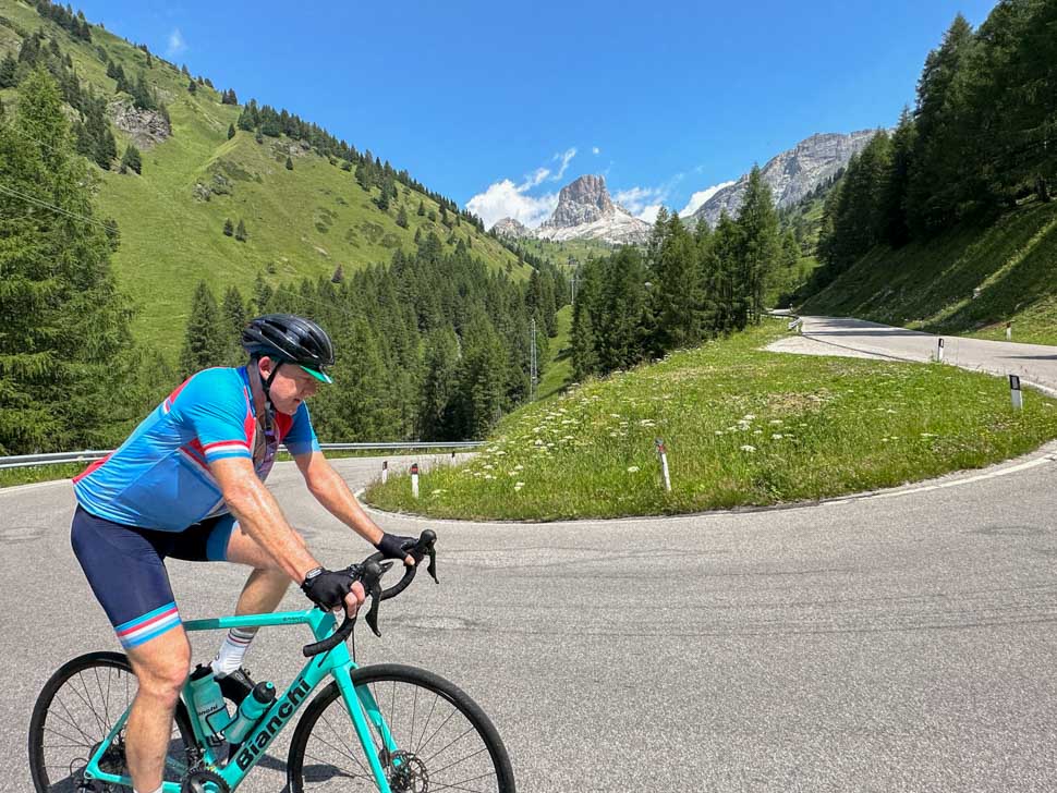 A man cycling up to Passo Giau in the Dolomites