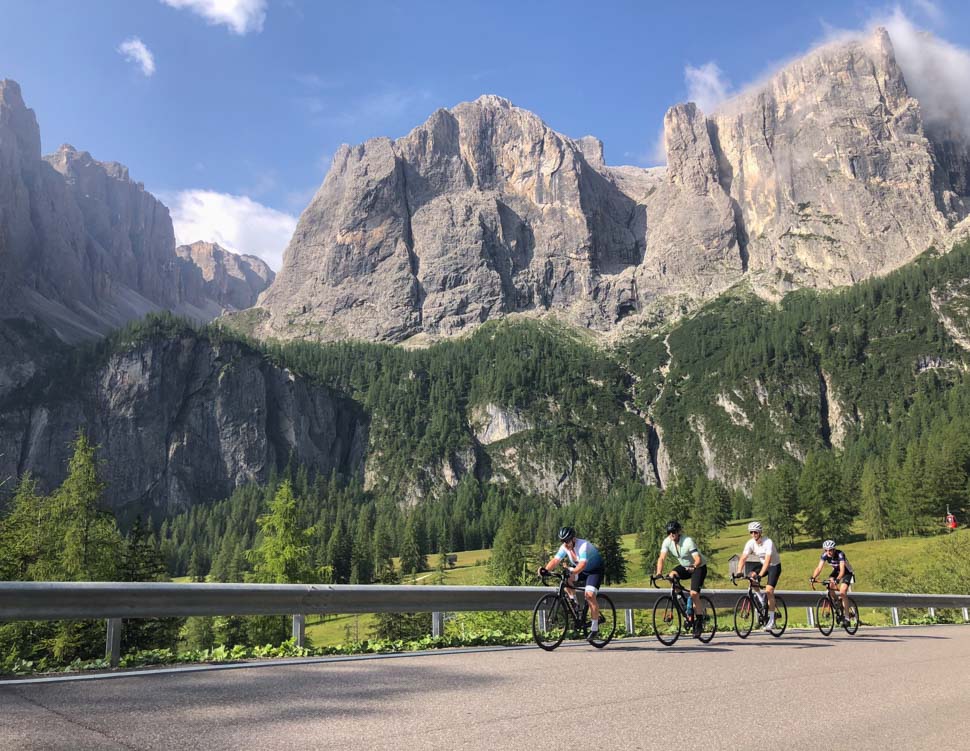 A group of cyclists in the Dolomites during an Italian cycling tour