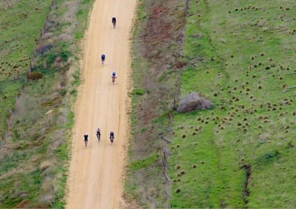 An aerial viewl of size riders on a gravel road near daylesford