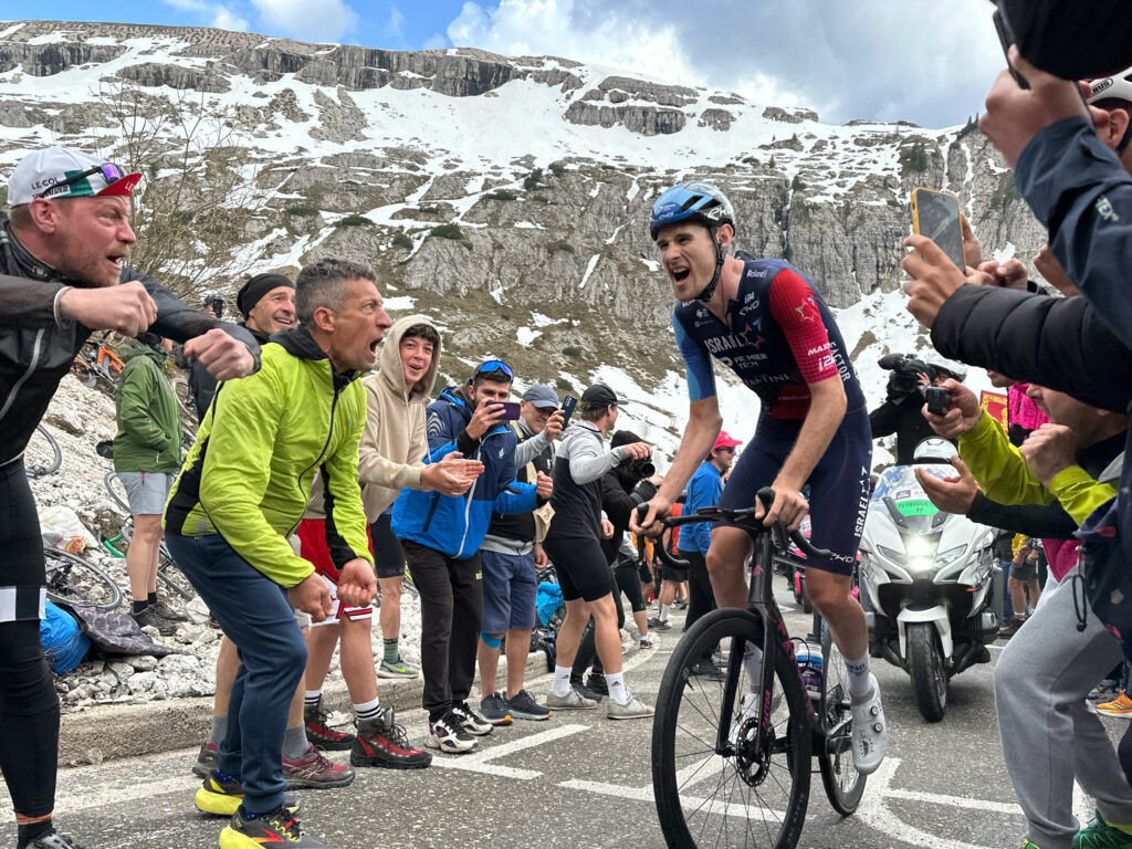 A rider in the Giro d'Italia racing up Tre Cime in the Dolomites, Italy