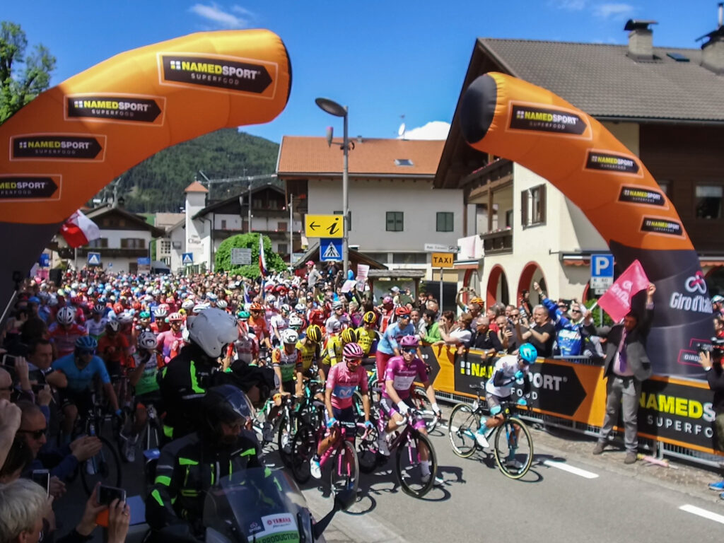 The start of a stage of the Giro d'Italia in the Dolomites