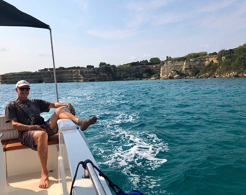A man on a boat in Otranto Puglia