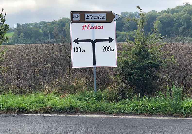 The sign for the 209 and 130km course at L'Eroica