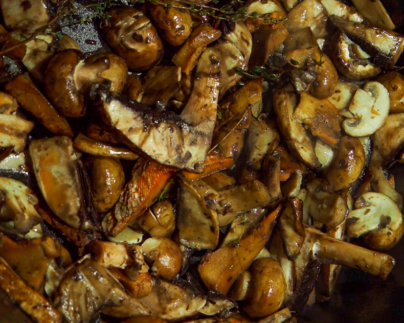 mushrooms cooking in a pan