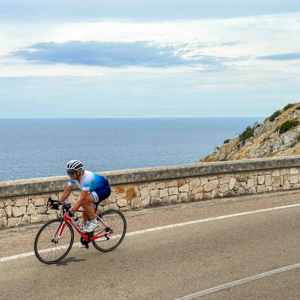 A woman on a cycling holiday in Puglia Italy