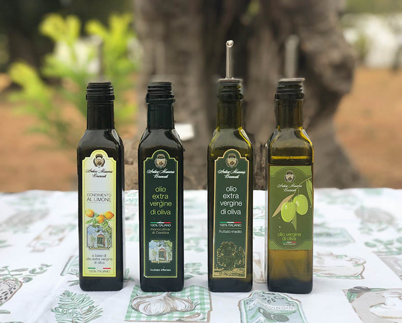 four bottles of different olive oil from Puglia