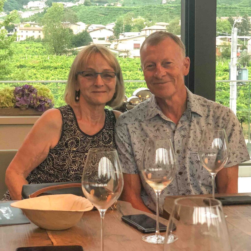 Two people at a prosecco wine tasting in Italy