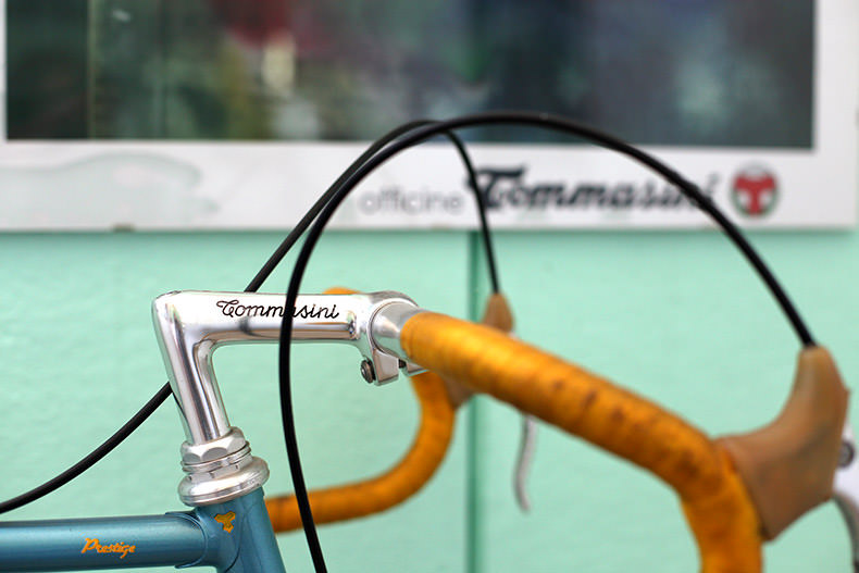 A vintage steel tommasini bike with a pantographed stem