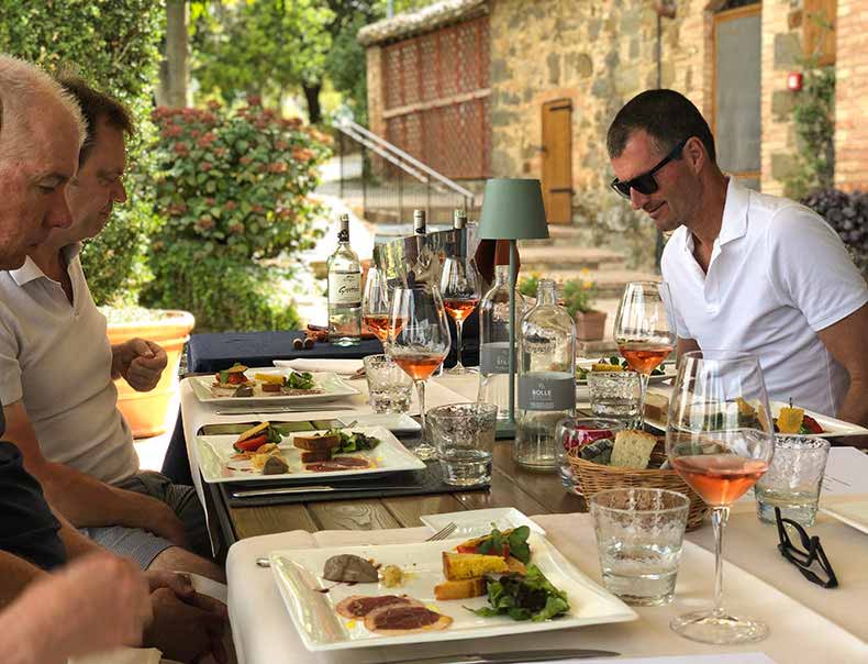 People enjoying a long tuscan lunch