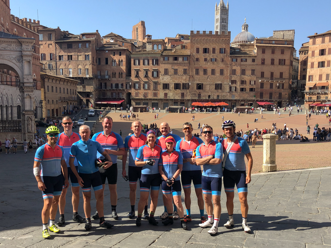 a group of cyclists in Siena's Camp dei fiori