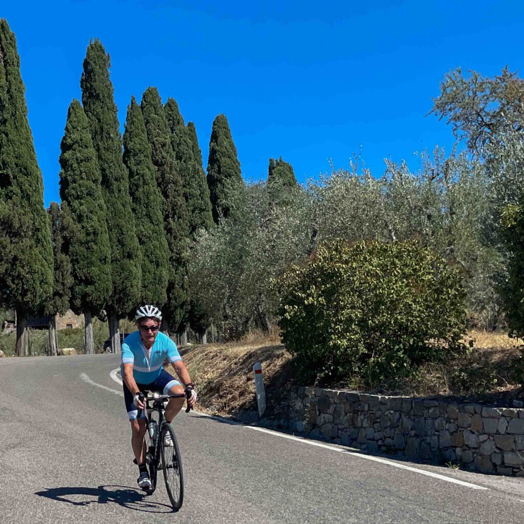 A man riding in Tuscany on his holiday