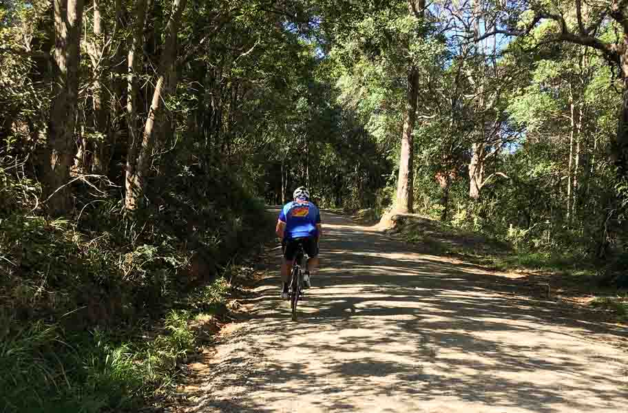 A man riding in the countryside near Noosa