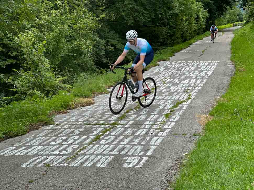 A rider climbing the Muro di Sormano in Italy