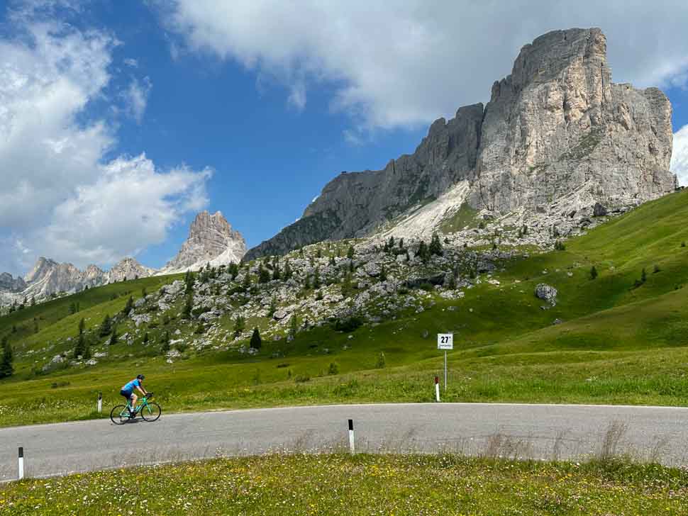 A rider climbing up to Passo Giau in the Dolomites Italy