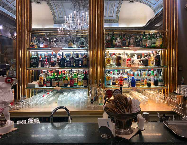 A bar in Turin lined with bottles