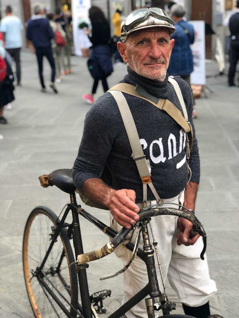 A rider with an old steel bicycles at L'eroica