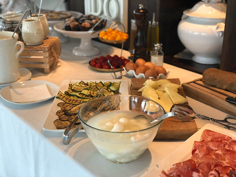 A breakfast table full of delicious food from Puglia