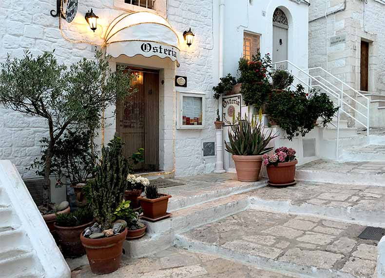 A front door of a trattoria in puglia