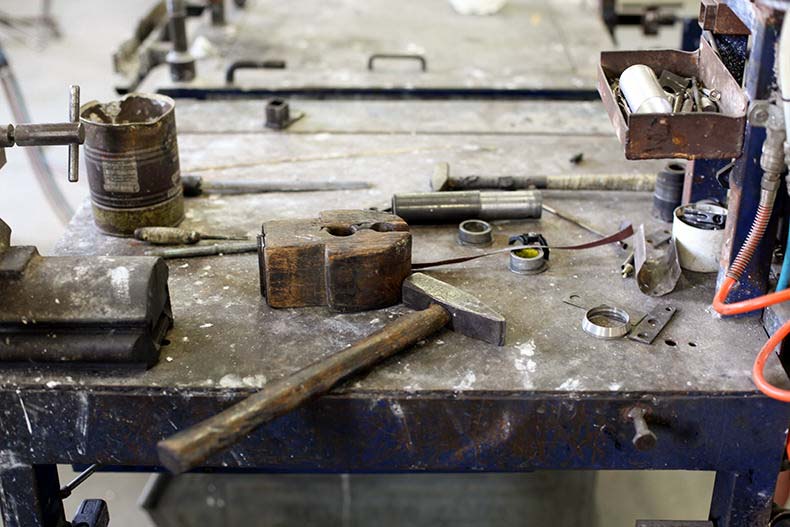 Bike building tools on a bench at Tommasini