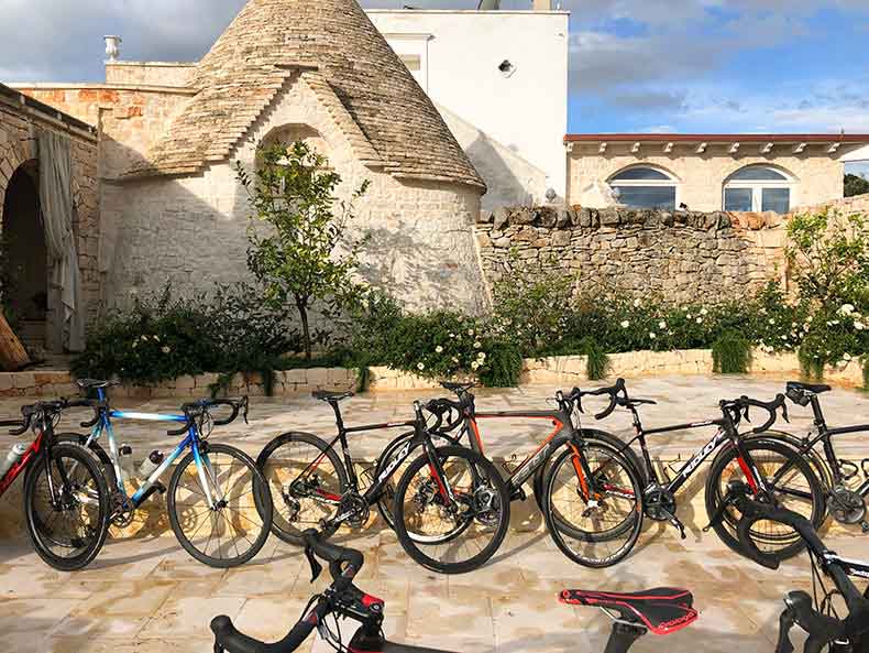 Bicycles parked near a trulli in Puglia