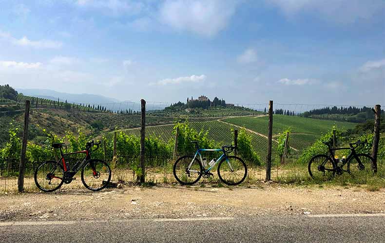 Bikes leaning against a fence in Chianti