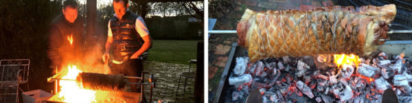 Porchetta being cooked on a spit over charcoal