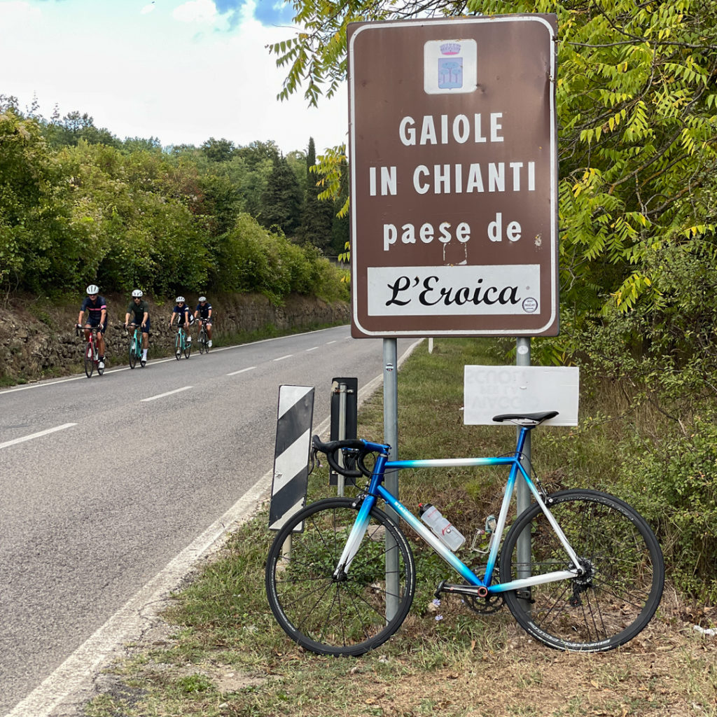 Gaiole in Chianti L'eroica sign with a custom Stelbel leaning in front