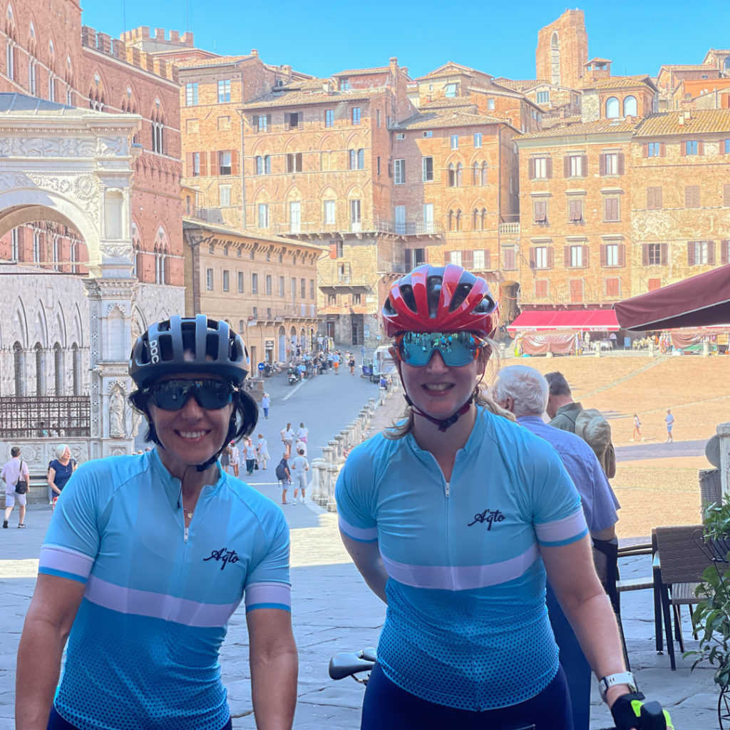 two women cyclists in Siena, Tuscany