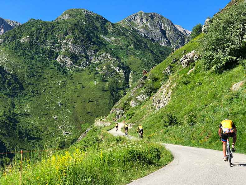 A cyclist climbing colle Fauniera