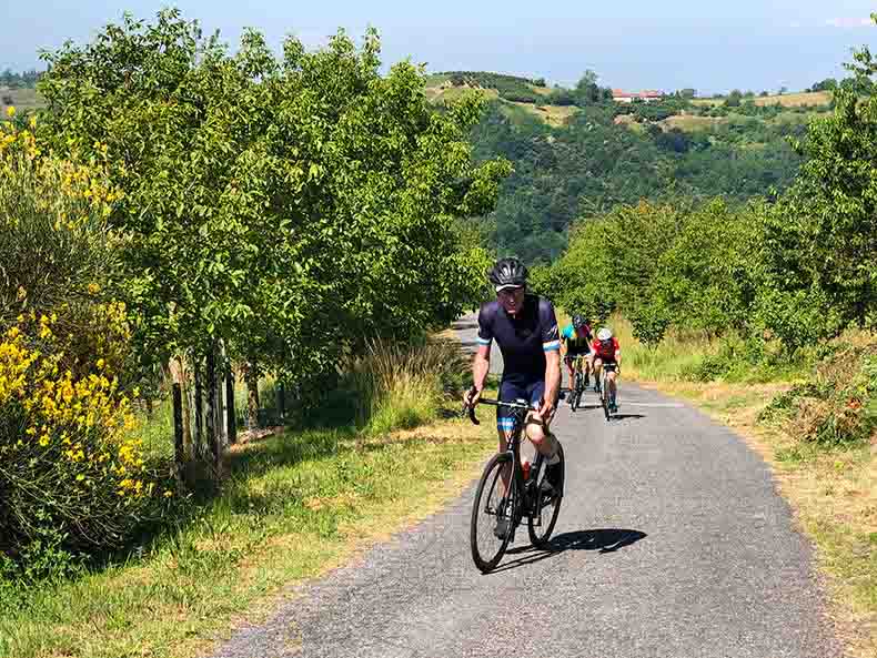 cyclists riding in the forests of Piemonte