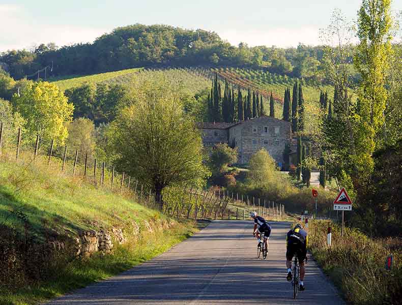 two cyclist riding in Tuscany
