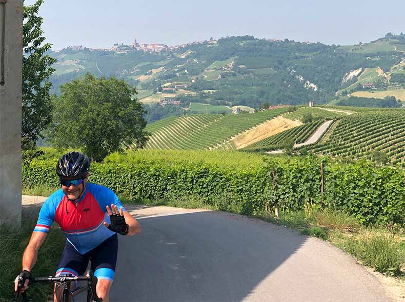 A man cycling through Le Langhe on a holiday