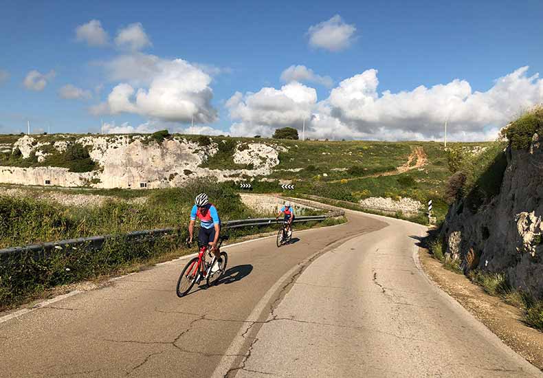 A group of riders cycling in Puglia