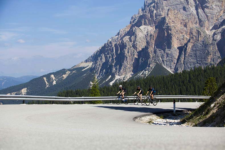 Three cyclists riding stelbel bikes in the Dolomites