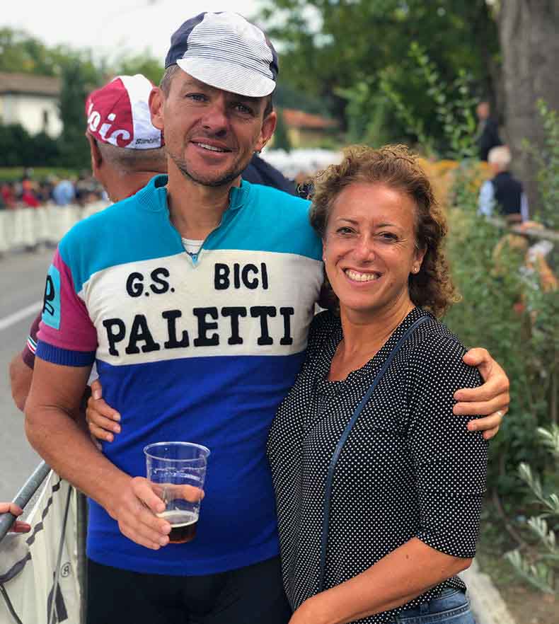 a man in a paletti jersey after finishing l"eroica