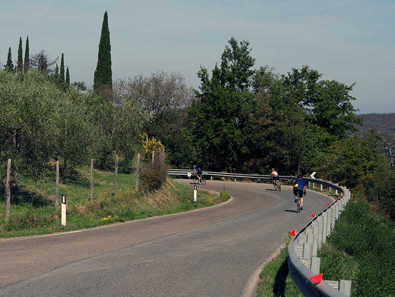 Riders cycling in Tuscany on holidays