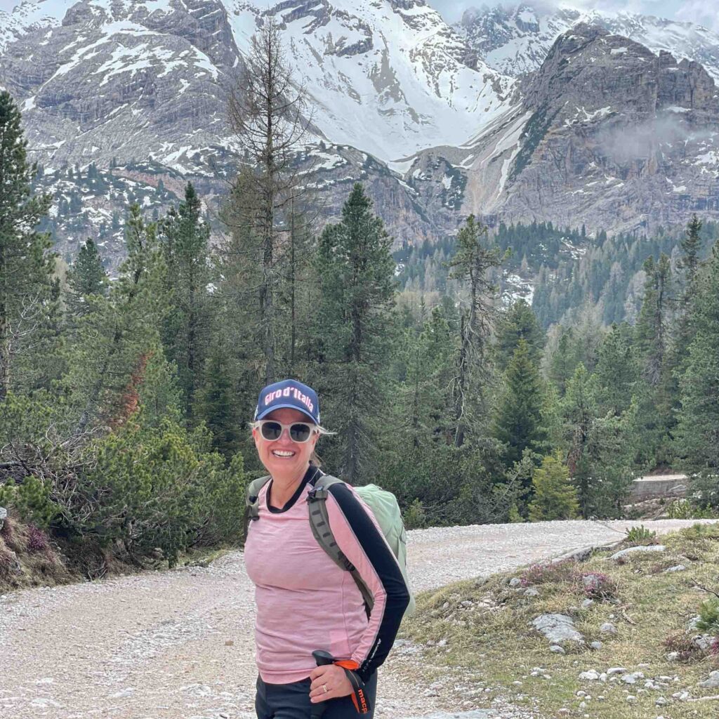 A lady walking in the Dolomites