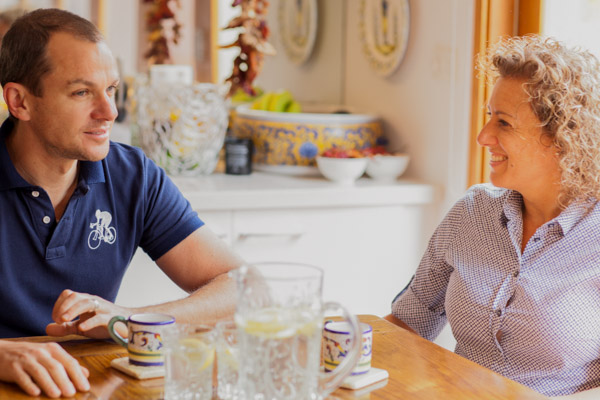 Two people drinking coffee