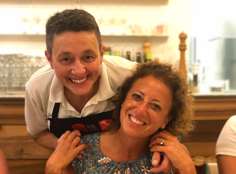 Two people in a trattoria in Italy