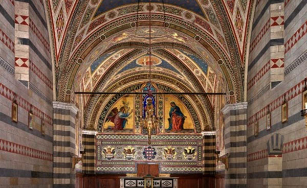 The mosaics on the ceiling of a chapel in Siena Italy
