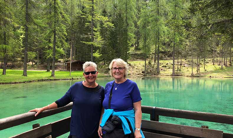 non riding partners at a mountain lake in Italy