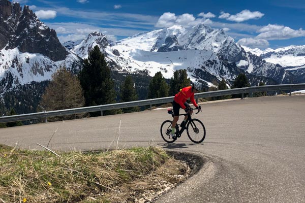 a man cycling in the Dolomites